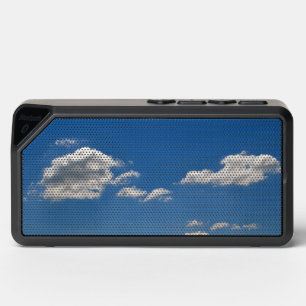 Sky is blue and white clouds are passing by bluetooth speaker