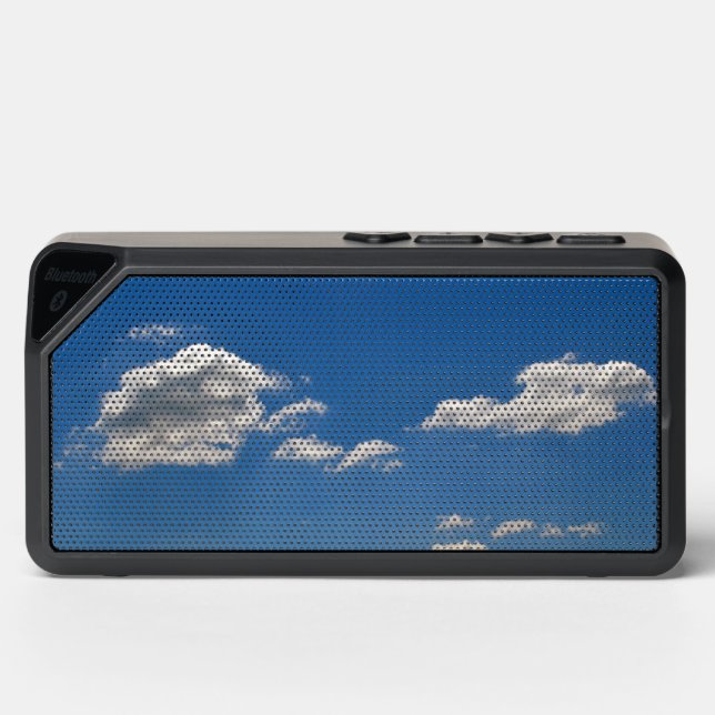 Sky is blue and white clouds are passing by   bluetooth speaker (Front)