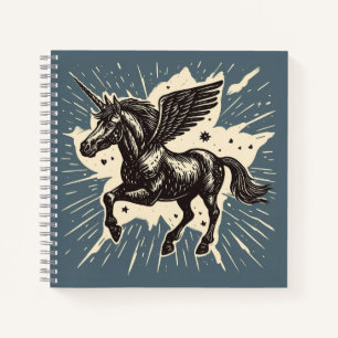 Skyborn Grace – Winged Unicorn on a Misty Blue Ni Notebook