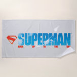Skybound Superman Silhouette Beach Towel<br><div class="desc">Let your imagination soar with this uplifting Superman design that captures the magic of flight! The bold blue “SUPERMAN” typography is filled with fluffy white clouds, creating the illusion of the open sky itself. A dynamic silhouette of Superman streaks upward from the letters, trailing a graceful arc of light that...</div>