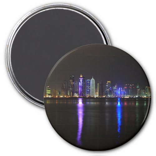 Skyline of Doha Qatar at night round magnet
