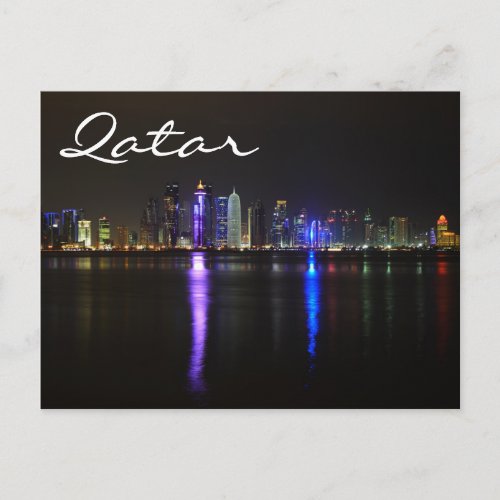 Skyline of Doha Qatar at night text postcard