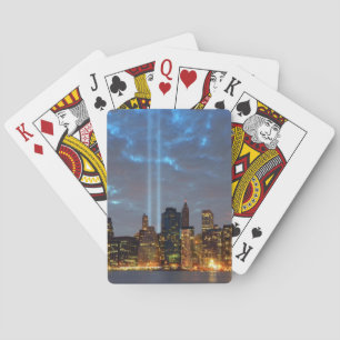 Skyline view of city in night. poker cards