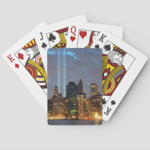 Skyline view of city in night. poker cards