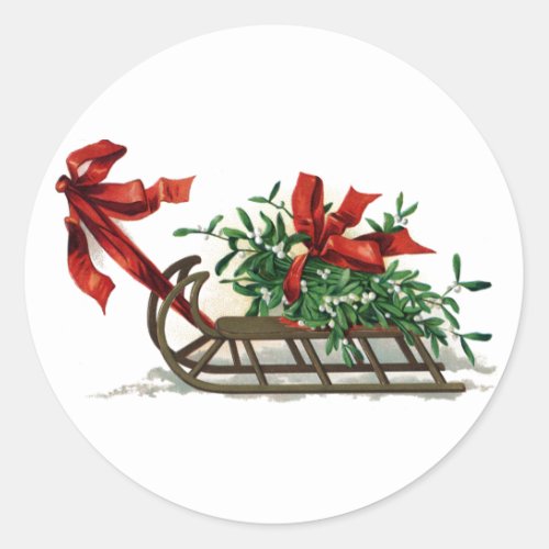 Sled with Bunch of Mistletoe Tied in Red Ribbon Classic Round Sticker
