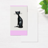 Sleek elegant black and white cat smiling (Desk)