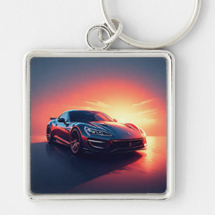 Sleek Sports Car Driving at Scenic Sunset Keychain