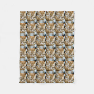 Sleeping orange tabby cat fleece blanket