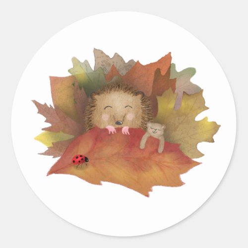 Sleepy hedgehog in a bed of leaves round stickers