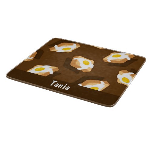 Slice of bread with egg pattern cutting board