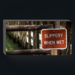 "Slippery When Wet" wooden sign for the house<br><div class="desc">Let people know to watch their step when you place this sign in the area.</div>
