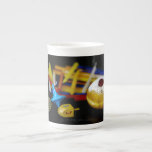 SlipperyJoe Hanukkah symbolic still life holiday e Bone China Mug<br><div class="desc">SlipperyJoe Hanukkah symbolic still life holiday essence vibrant meaningful objects colorful slender pile menorah candles artistic red blue yellow and white sufganiyah doughnut classic jelly-filled commemorate miracle of the oil dreidels metallic gold glossy blue Hebrew great miracle happened there metallic pewter star of David medallion light resilience community themes spiritual...</div>