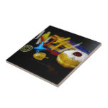 SlipperyJoe Hanukkah symbolic still life holiday e Ceramic Tile<br><div class="desc">SlipperyJoe Hanukkah symbolic still life holiday essence vibrant meaningful objects colorful slender pile menorah candles artistic red blue yellow and white sufganiyah doughnut classic jelly-filled commemorate miracle of the oil dreidels metallic gold glossy blue Hebrew great miracle happened there metallic pewter star of David medallion light resilience community themes spiritual...</div>