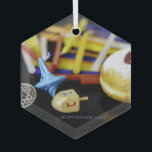SlipperyJoe Hanukkah symbolic still life holiday e Glass Ornament<br><div class="desc">SlipperyJoe Hanukkah symbolic still life holiday essence vibrant meaningful objects colorful slender pile menorah candles artistic red blue yellow and white sufganiyah doughnut classic jelly-filled commemorate miracle of the oil dreidels metallic gold glossy blue Hebrew great miracle happened there metallic pewter star of David medallion light resilience community themes spiritual...</div>