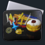 SlipperyJoe Hanukkah symbolic still life holiday e Laptop Sleeve<br><div class="desc">SlipperyJoe Hanukkah symbolic still life holiday essence vibrant meaningful objects colorful slender pile menorah candles artistic red blue yellow and white sufganiyah doughnut classic jelly-filled commemorate miracle of the oil dreidels metallic gold glossy blue Hebrew great miracle happened there metallic pewter star of David medallion light resilience community themes spiritual...</div>