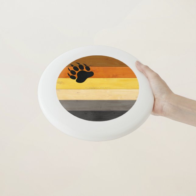 SlipperyJoe's Bear Pride flag wooden floor texture Wham-O Frisbee (In Hand)