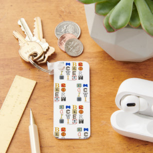 SlipperyJoe's embraces diversity cut-out letters c Keychain