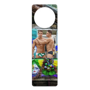 SlipperyJoe's festive Mardi Gras scene two men wea Door Hanger