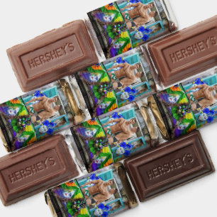 SlipperyJoe's festive Mardi Gras scene two men wea Hershey's Miniatures