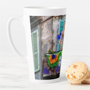 SlipperyJoe's festive Mardi Gras scene two men wea Latte Mug