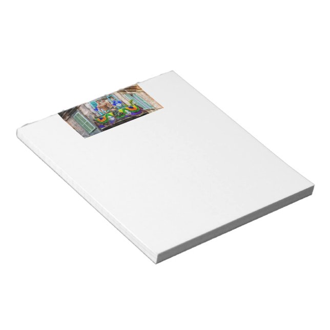 SlipperyJoe's festive Mardi Gras scene two men wea Notepad (Angled)