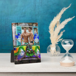 SlipperyJoe's festive Mardi Gras scene two men wea Plaque