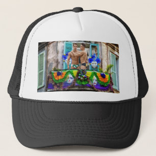 SlipperyJoe's festive Mardi Gras scene two men wea Trucker Hat