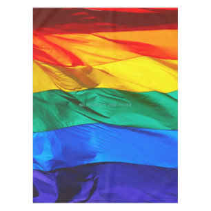 SlipperyJoe's gay pride flag waving red orange yel Tablecloth