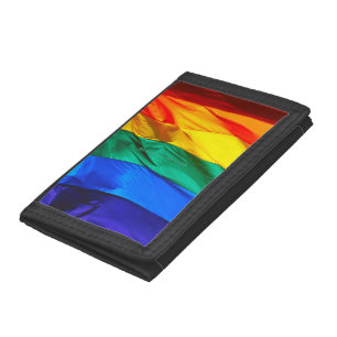 SlipperyJoe's gay pride flag waving red orange yel Trifold Wallet