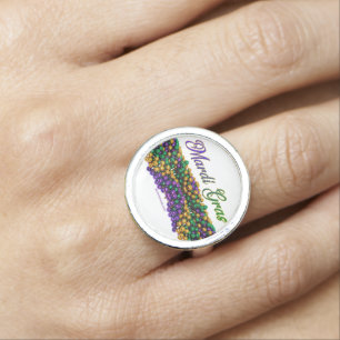 SlipperyJoe's iconic Mardi Gras–themed image elega Ring