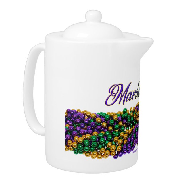 SlipperyJoe's iconic Mardi Gras–themed image elega Teapot (Left)