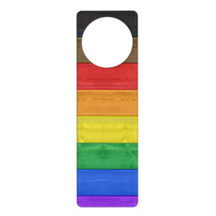 SlipperyJoe's Inclusive gay pride flag textured ru Door Hanger