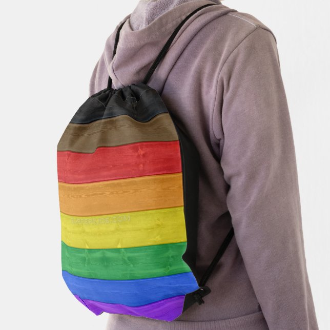 SlipperyJoe's Inclusive gay pride flag textured ru Drawstring Bag (Insitu)