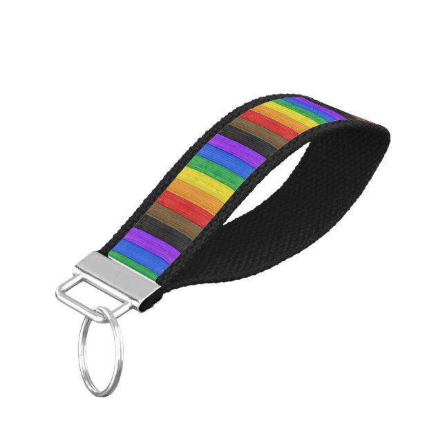 SlipperyJoe's Inclusive gay pride flag textured ru Wrist Keychain (Angled Down)