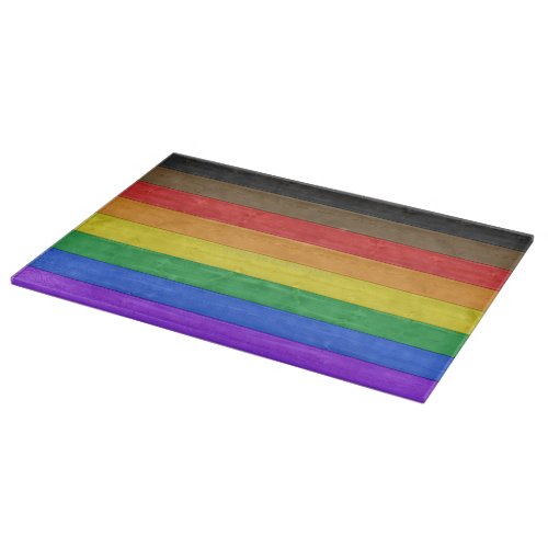 SlipperyJoes inclusive gay pride flag wooden blac Cutting Board