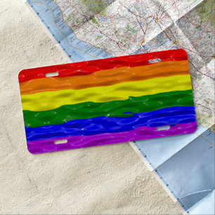 SlipperyJoe's liquid gloss pride flag red orange y License Plate