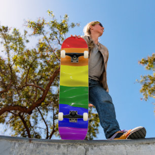 SlipperyJoe's liquid gloss pride flag red orange y Skateboard