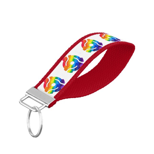 SlipperyJoe's plastic 45 RPM record adapter vibran Wrist Keychain (Angled Down)