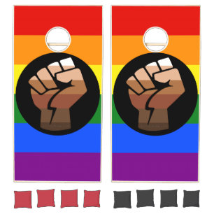 SlipperyJoe's queer people color flag raised fist Cornhole Set