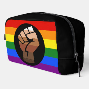 SlipperyJoe's queer people color flag raised fist Dopp Kit