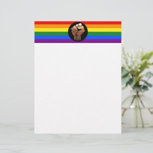 SlipperyJoe's queer people color flag raised fist  Letterhead