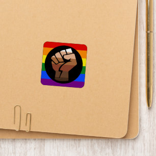 SlipperyJoe's queer people color flag raised fist Patch