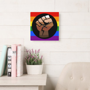 SlipperyJoe's queer people color flag raised fist Square Wall Clock