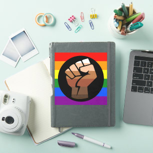 SlipperyJoe's queer people color flag raised fist Sticker