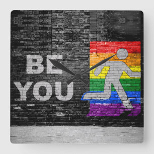 SlipperyJoe's rainbow pride colors panel urban str Square Wall Clock