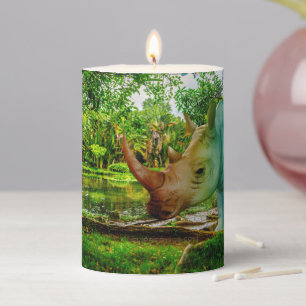 SlipperyJoe's rhinoceros lush tropical setting pri Pillar Candle