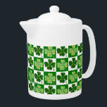 SlipperyJoe's Saint Patrick's Day four leaf clover Teapot<br><div class="desc">SlipperyJoe's Saint Patrick's Day four leaf clover shamrock symbolizing luck Irish tradition artistic subtle crosshatch textures alternating green and white squares repeating checkerboard pattern plaid patterns shades yellow lime bold festive wallpaper background classic symbols LGBTQIA gifts</div>