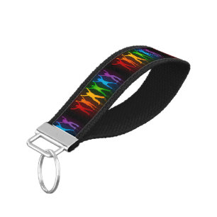 Slipperyjoe's six standing silhouettes arms raised wrist keychain