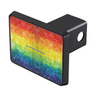 SlipperyJoe's tie-dyed flag rainbow pressed into s Hitch Cover