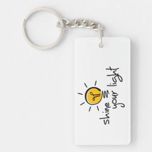 Slogan shine your light. Let your light shine. Keychain